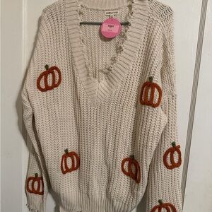 Main Strip Cream V-Neck Sweater with Orange Pumpkin Accents